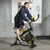 Sportnow hometrainer met verstelbare zit en weerstand, fitnessfiets met lcd display, hartslagsensor, indoor cycling bike, staal, geel 2