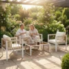 Tuinmeubelset 4 delig Polyrattan Lounge Set Met Tweezitter 2 Stoelen Glazen Tafel Afneembare Kussens Antislip Mat