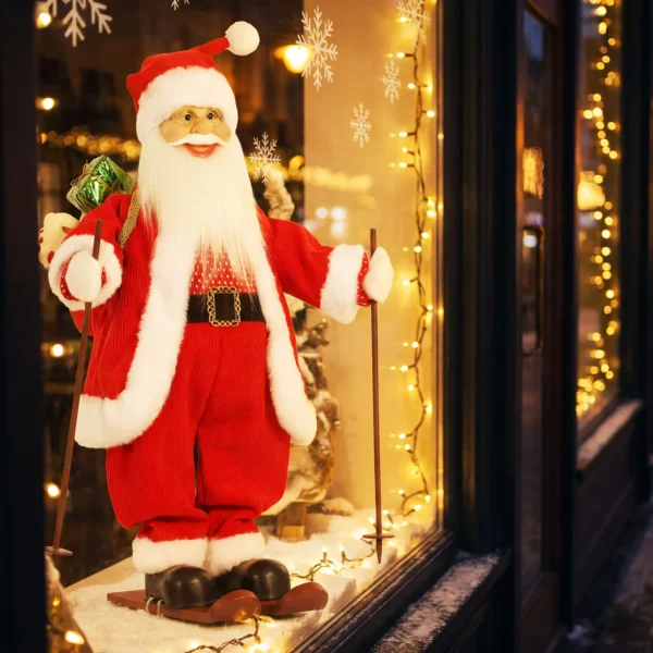 Zingende Ski Kerstman, 66 Cm, Geanimeerde Staande Kerstfiguur Met Ski's, Geschenkzak En Geluids /aanraakactivering